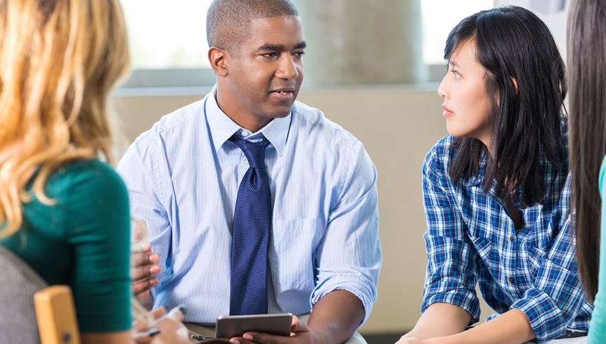 Casual three person meeting