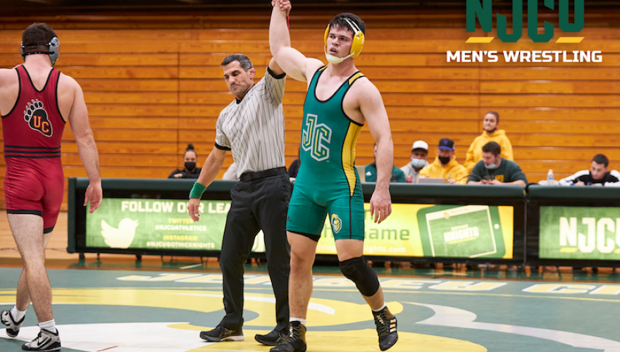 men wrestling arm up winner photo