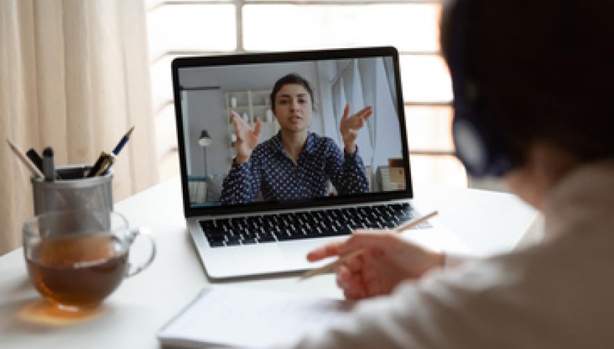 STUDENT VIEWING LAPTOP EVENT