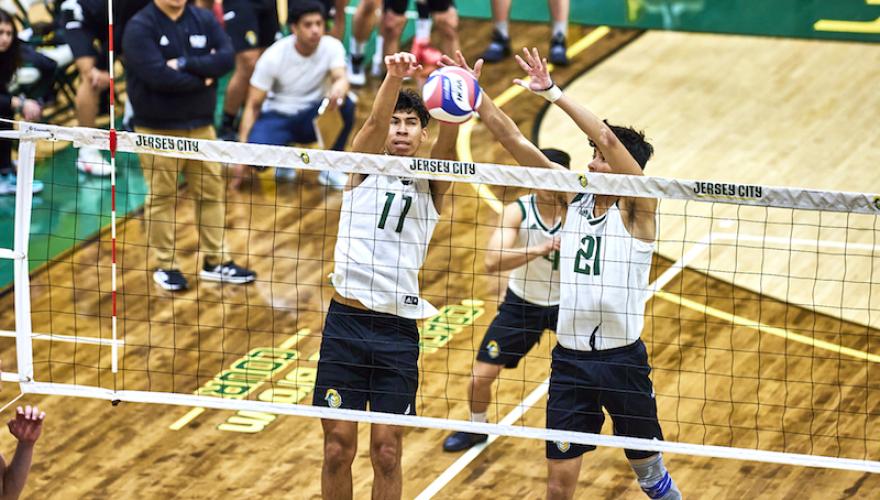 mens volleyball 2 at net