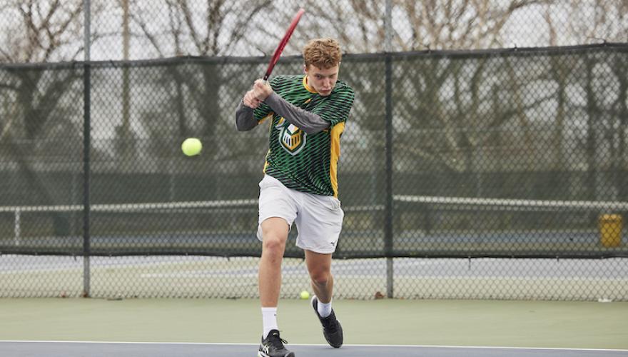 TENNIS PLAYER SWINGS ARE A BALL