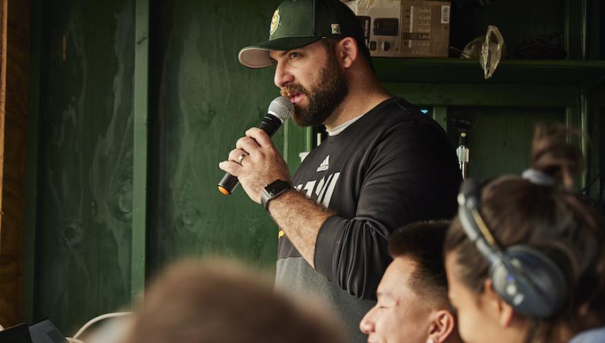 MALE BASEBALL PLAYER WITH MICROPHONE