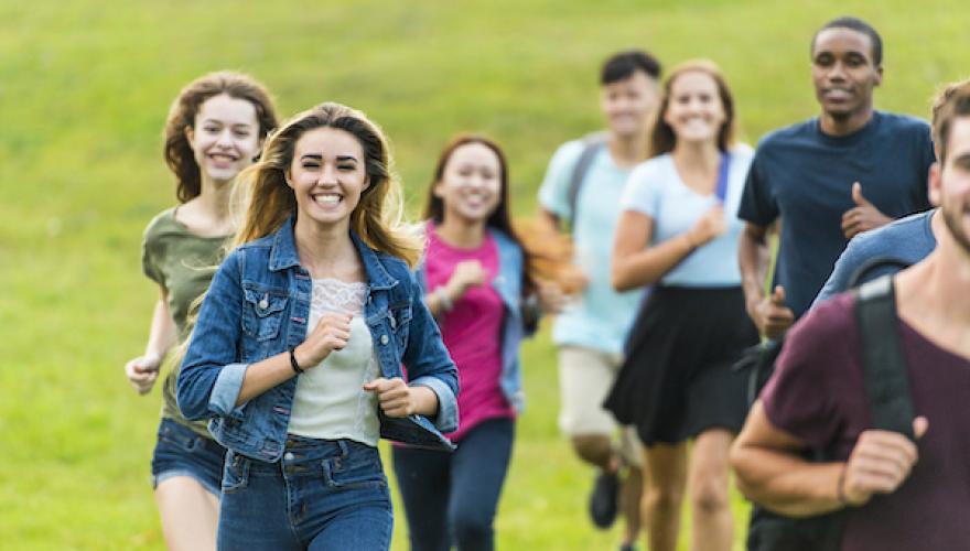 group running on grass