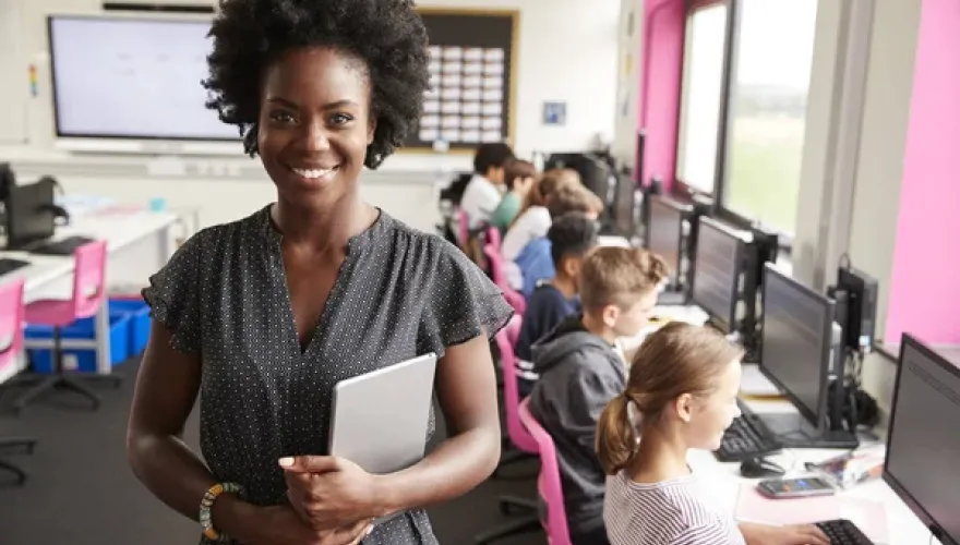Teacher in Computer Lab with tablet