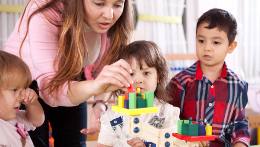 Teacher and young students