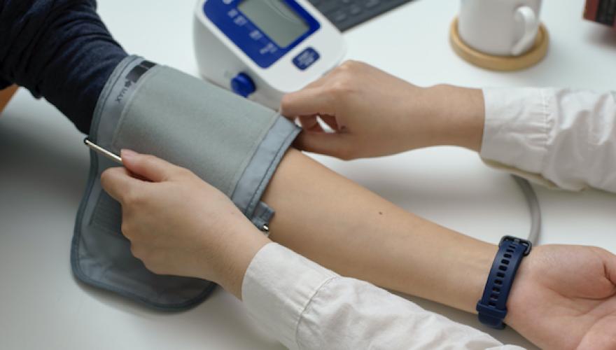 BLOOD PRESSURE TAKEN WITH ARM REVEALED