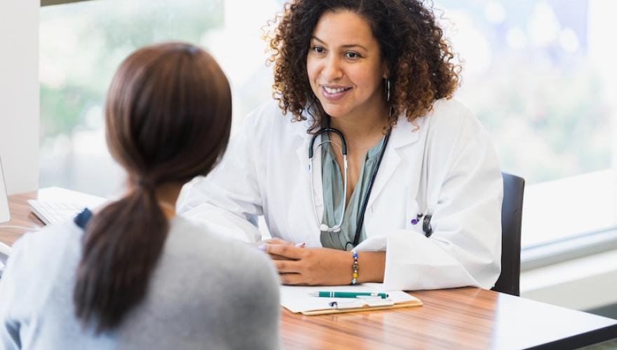 FEMALE DOCTOR AND PATIENT