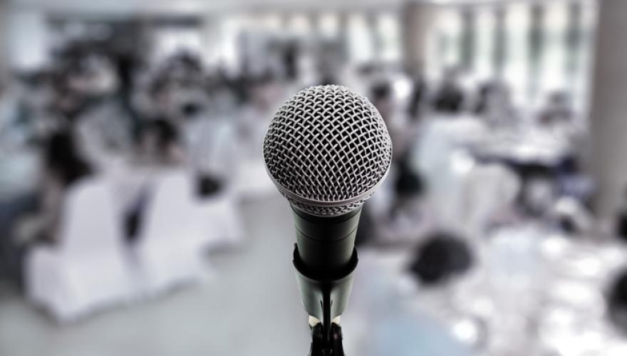 standing microphone in group gathering space