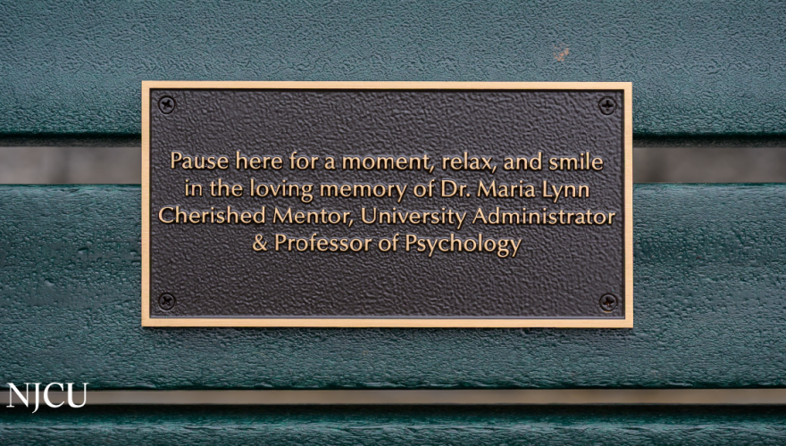 Engraved plaque on the Dr. Maria Lynn Memorial Bench