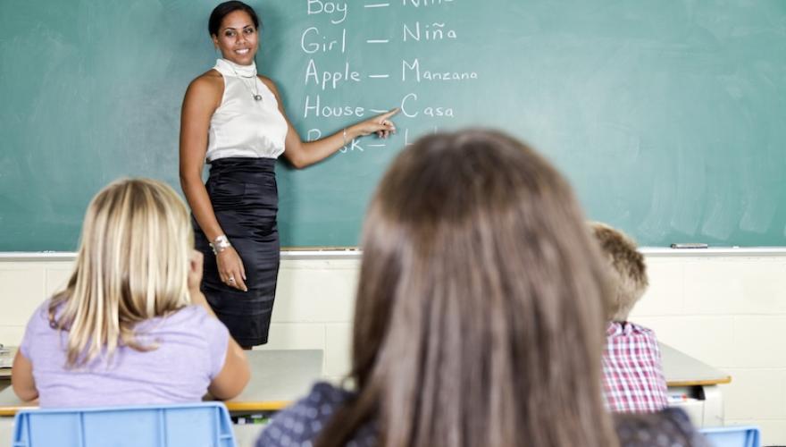classroom with teacher teaching spanish