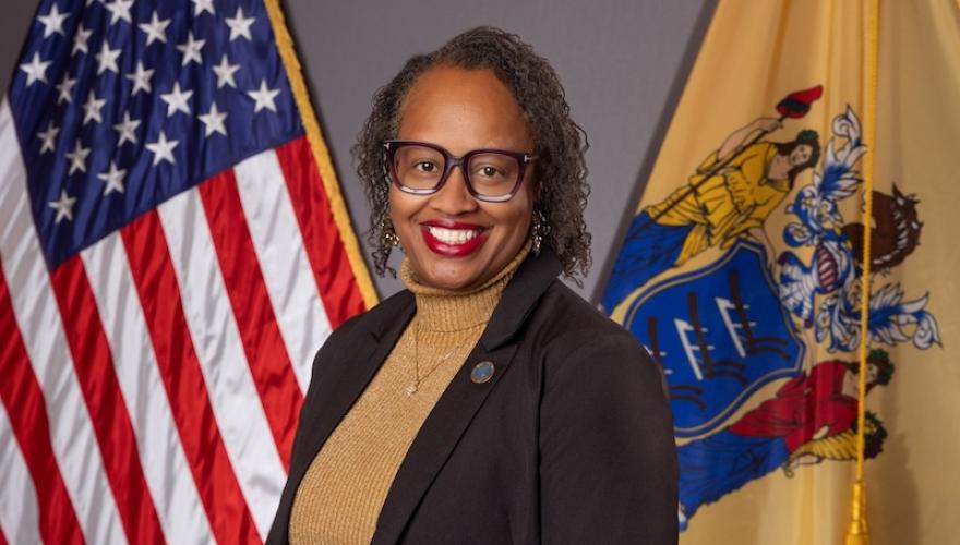 angela mcknight posed with flags