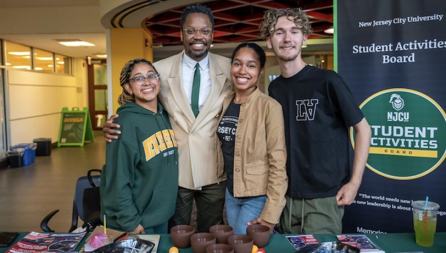 four people at sga table