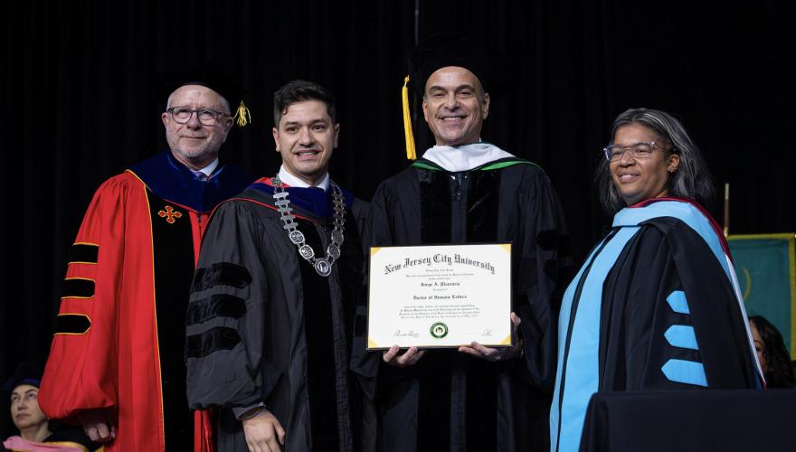 Honorary degree recipient Jorge A. Plasencia poses with David S. Birdsell, Ph.D., President Acebo, and Pia Stevens Haynes, Acting VP for Student Affairs.