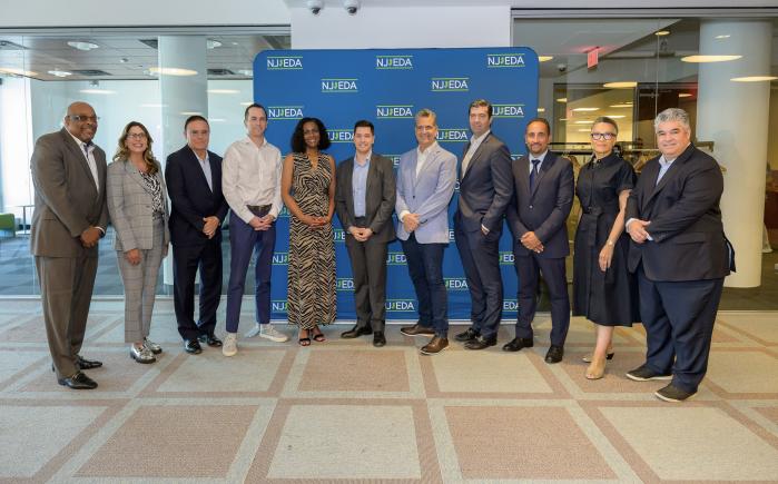 Dignitaries gather for a photo after the joint event with NJCU, NJEDA and the SHCCNJ on July 30, 2025.