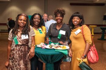 young alumni at homecoming event