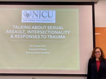 WOMAN IN FRONT OF SCREEN PRESENTATION