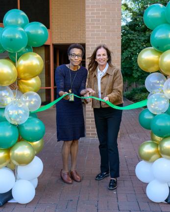 Dr. Mary McGriff and Dr. Michelle Rosen cutting the ribbon