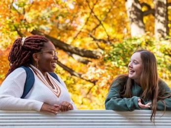 Two Kean students have a chat outside