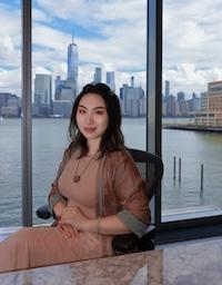 Zhoulin Sellina Xie seated at window
