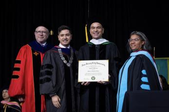 Honorary degree recipient Jorge A. Plasencia poses with David S. Birdsell, Ph.D., President Acebo, and Pia Stevens Haynes, Acting VP for Student Affairs.